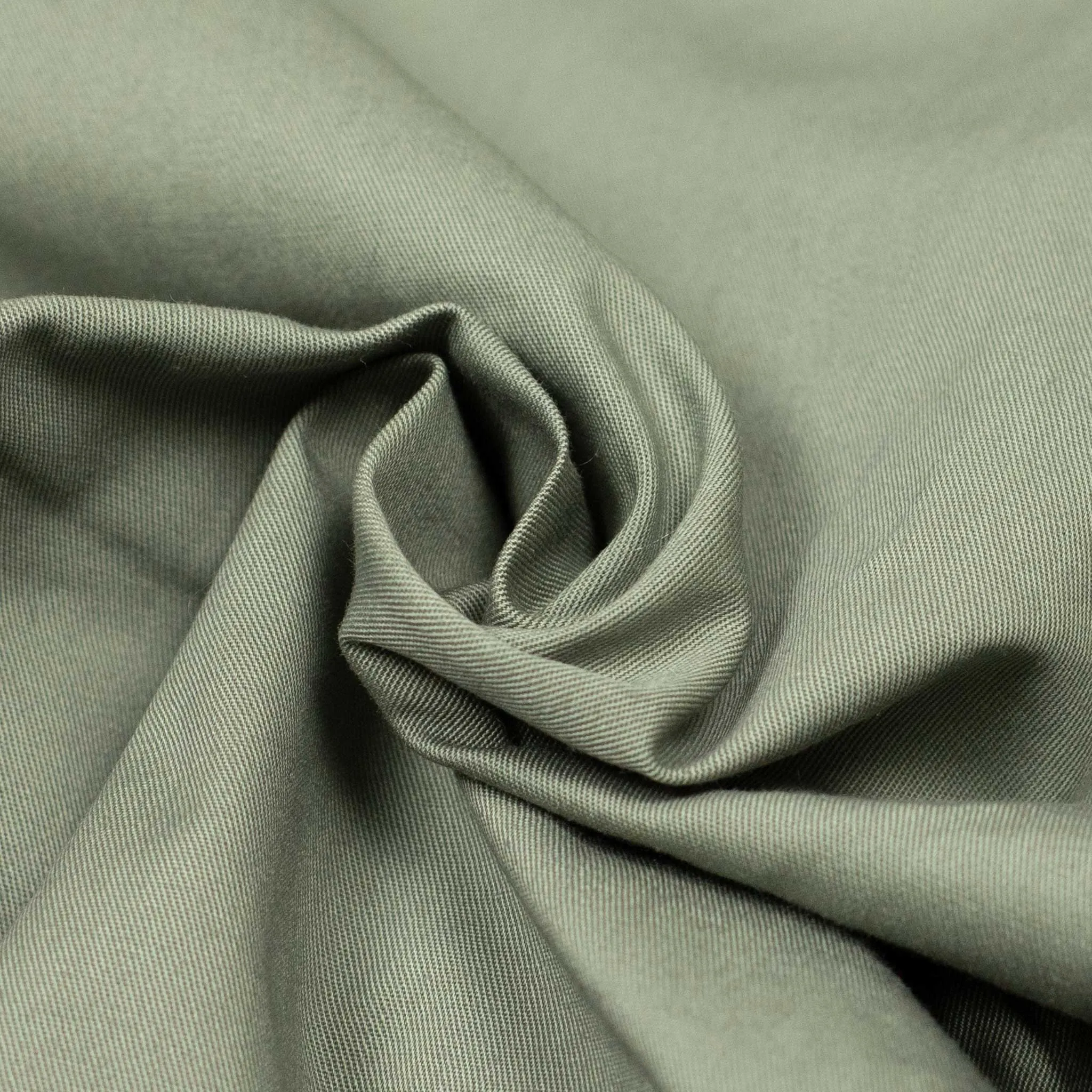Comanche single-pleat trousers in pale olive light cotton twill